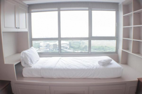 Warm and Cozy Studio at Springlake Summarecon Apartment By Travelio